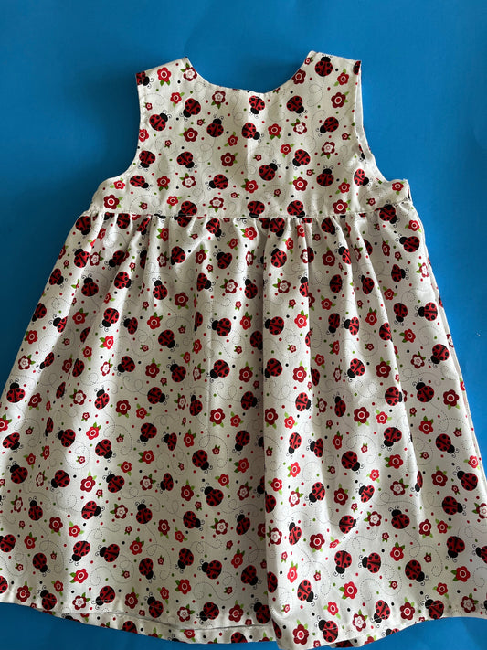 Child's Dress SL, White w/Ladybugs